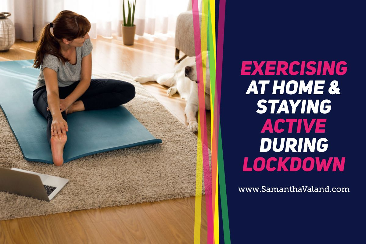 Women exercsing at home with laptop and her dog